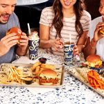 Eaters enjoying a meal at Bobby's Burgers.