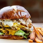 A Native Foods jalapeno popper burger and fries