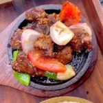 A Bajeko Sekuwa grillled meat griddle.