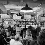 Customers gather as they watch a game at the bar area at Piece Out. Photo courtesy of Piece Out Del Ray.