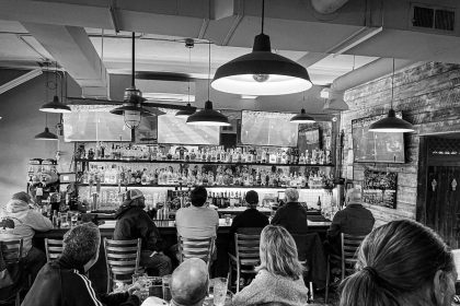 Customers gather as they watch a game at the bar area at Piece Out. Photo courtesy of Piece Out Del Ray.