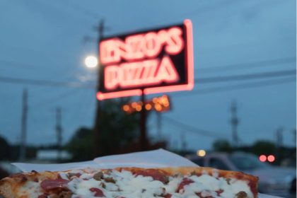 The family-owned Italian pizzeria serves pizza as a pie or by the slice and sells other food options such as pastas, salads, sandwiches, and wings.