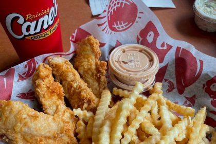 It has been previously reported that Raising Cane’s Chicken Fingers postponed its Union Station location opening to 2026. Photo Credit: Raising Cane’s Chicken Fingers’ Facebook page.