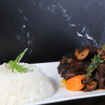 Perfect Seasoning is known for its Carribbean-inspired menu, which includes Oxtails and Jamaican Jerk Smoked Chicken. Photo Credit: Perfect Seasoning Website.