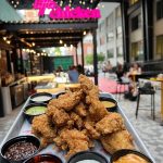 Little Chicken is known for its signature fried chicken, full bar and indoor and outdoor seating areas. Photo Credit: Little Chicken Instagram