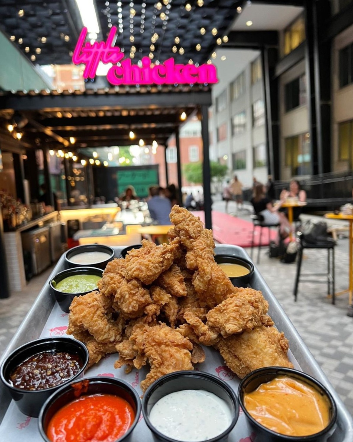 Little Chicken is known for its signature fried chicken, full bar and indoor and outdoor seating areas. Photo Credit: Little Chicken Instagram