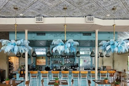 Above, a picture of Primrose’s indoor seating area. Parachute Pizza’s menu will also include oysters, salads, wines, garlic knots, and wines. Photo Credit: Primrose’s Facebook page