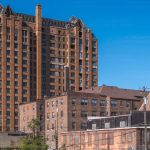 Groundbreaking ceremony launches renovation of the 15-story Art Deco landmark into 117 affordable senior apartments by late 2026.