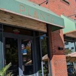 Plant-based restaurant chain seeks reorganization amid industry-wide financial strain.