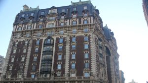 10 residential units above ground-floor commercial space proposed after demolition of historic building