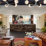 The hotel offers features like 93 guest rooms, an outdoor pool, and a terrace