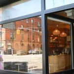 The menu highlights the Asian heritage of the restaurant partners.