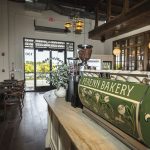 Perenn Bakery’s new Berry Hill location on Sidco Drive offers artisanal breads, pastries, coffee, and on-site baking processes for guests.