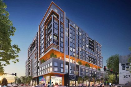 The mixed-use building brings 300+ housing units alongside a commercial space.