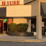 The fast food restaurant was cited for dirty utensils, absence of a PIC, and other violations.