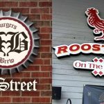 Burgers and Brew and Roosters On The River received yellow placards during their respective routine inspections.