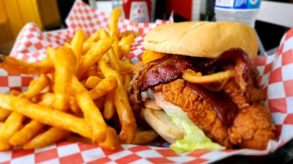 Halal Fried Chicken's Crispy fried chicken burger and fries