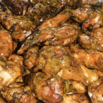 Alkebu-Lan Images Bookstore, SmoQe Signals BBQ Team Up On Hospitality Development