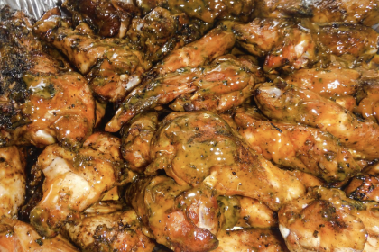 Alkebu-Lan Images Bookstore, SmoQe Signals BBQ Team Up On Hospitality Development