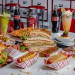 El Cuban Diner, located on Calle Ocho, the newest concept from Gastronomica Miami, is celebrating its grand opening on October 30, 2025. The community is invited to experience the immersive 1950s Cuba design