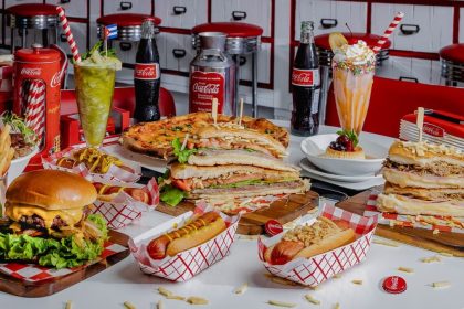 El Cuban Diner, located on Calle Ocho, the newest concept from Gastronomica Miami, is celebrating its grand opening on October 30, 2025. The community is invited to experience the immersive 1950s Cuba design