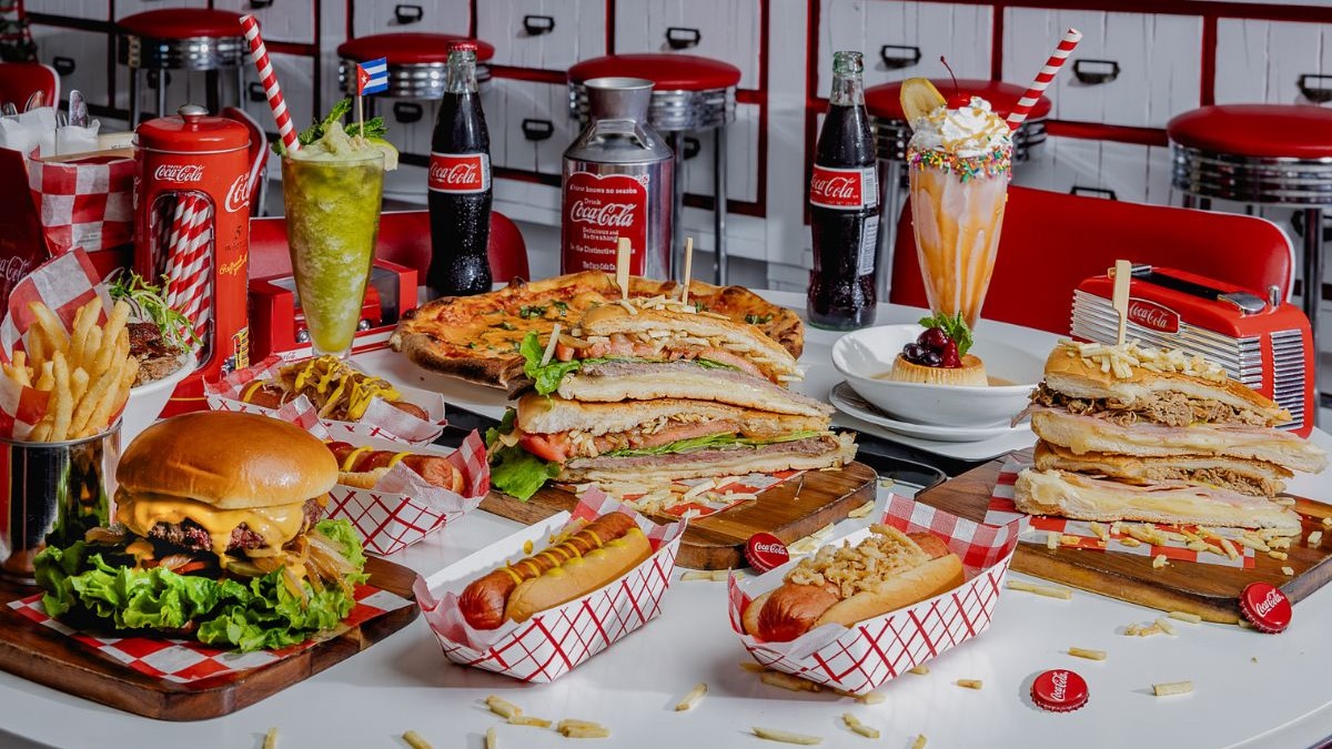 El Cuban Diner, located on Calle Ocho, the newest concept from Gastronomica Miami, is celebrating its grand opening on October 30, 2025. The community is invited to experience the immersive 1950s Cuba design