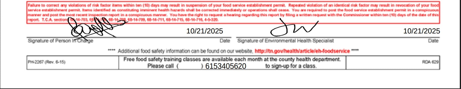 An employee’s cell phone was seen stored on an active food prep table.