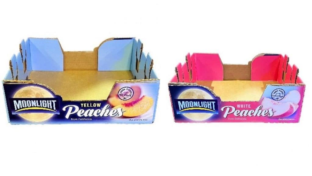 Boxes of California-grown yellow and white peaches sold by Moonlight brand