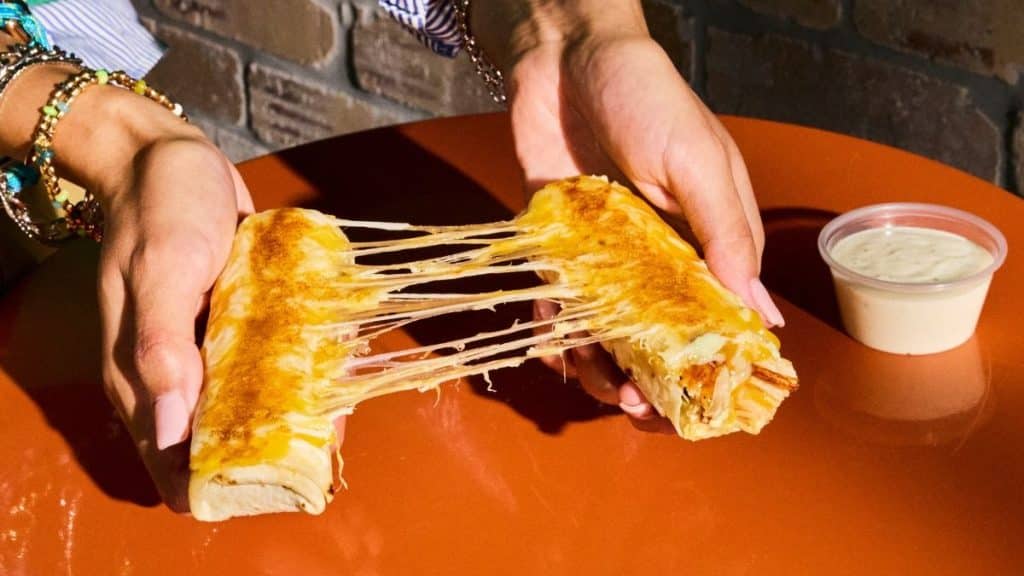 Image of Cheesy Dipping Burritos by Taco Bell with creamy garlic sauce