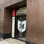 The space brings together multiple facilities, like a gourmet grocery, cafe, bar, and restaurant in one location