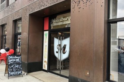 The space brings together multiple facilities, like a gourmet grocery, cafe, bar, and restaurant in one location