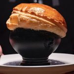 A close up of Confidant's prawn pot pie