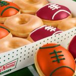 The limited-edition box features football-shaped doughnuts in vibrant team colors along with the company’s classic Original Glazed