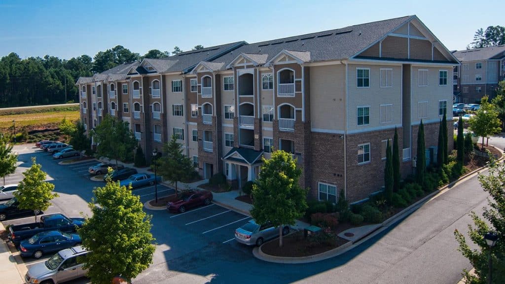 ECI Group acquires Riverside Parc Apartments.