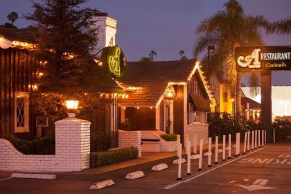 A Restaurant completes a century in Newport Beach, celebrating its evolution from The Arches in 1926 to a modern coastal steakhouse. 