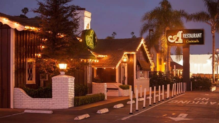 A Restaurant completes a century in Newport Beach, celebrating its evolution from The Arches in 1926 to a modern coastal steakhouse. 