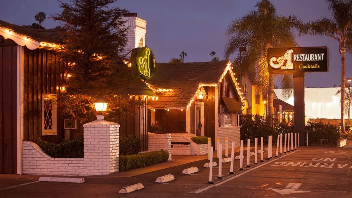 A Restaurant completes a century in Newport Beach, celebrating its evolution from The Arches in 1926 to a modern coastal steakhouse. 
