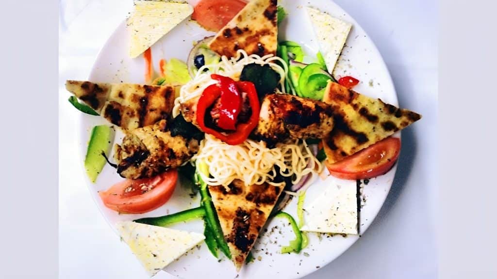 Chicken Kebab Salad served at Olympia Restaurant (Source: Yelp by Olympia Restaurant)