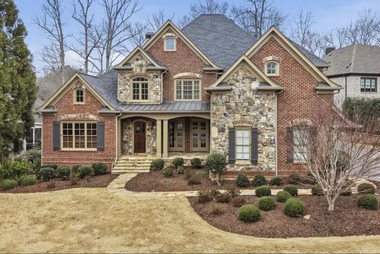 A John Willis Custom Residence with Private Pool in a Gated River Community