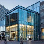 The space will be redeveloped to include new luxury retail stores, an Italian food market, and a Greek restaurant