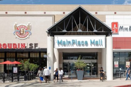 The Carina at MainPlace Mall begins construction.
