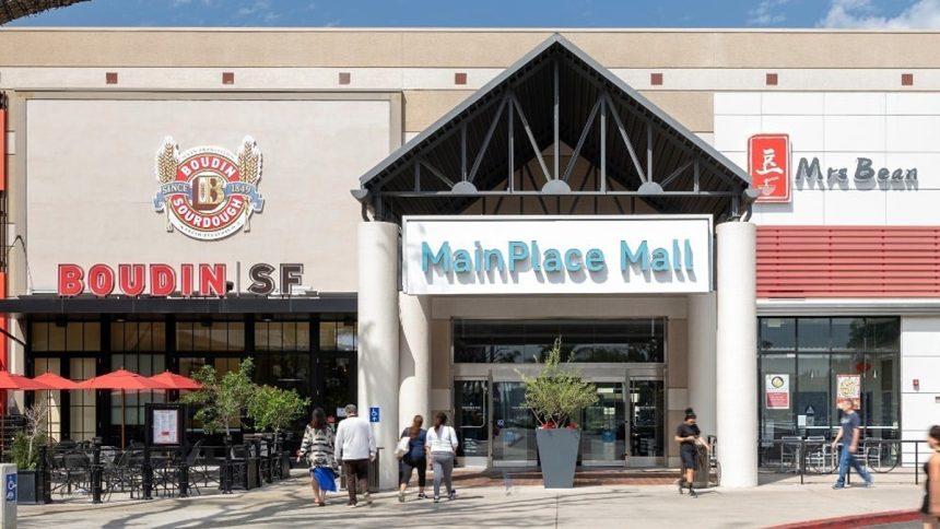 The Carina at MainPlace Mall begins construction.