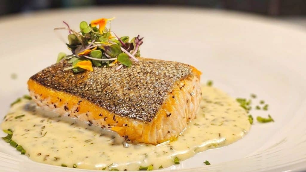 Ora King Salmon with a sauce, a part of The Creek’s menu