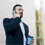 Person talking over the phone image