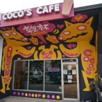 This image shows a storefront image of the Guadalupe location of CoCo’s Cafe