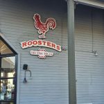 Roosters on the River front image