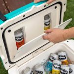 Dogfish Head is bringing a limited-edition cooler with a hidden compartment designed to keep favorite canned cocktails tucked away. 