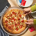 This image shows the Parmesan Stuffed Crust offering by Domino’s