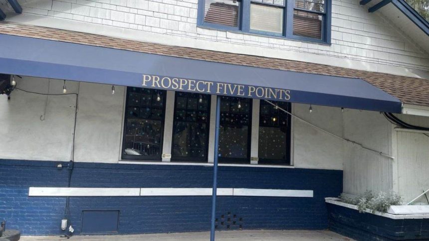 This image shows a storefront view of Prospect Five Points