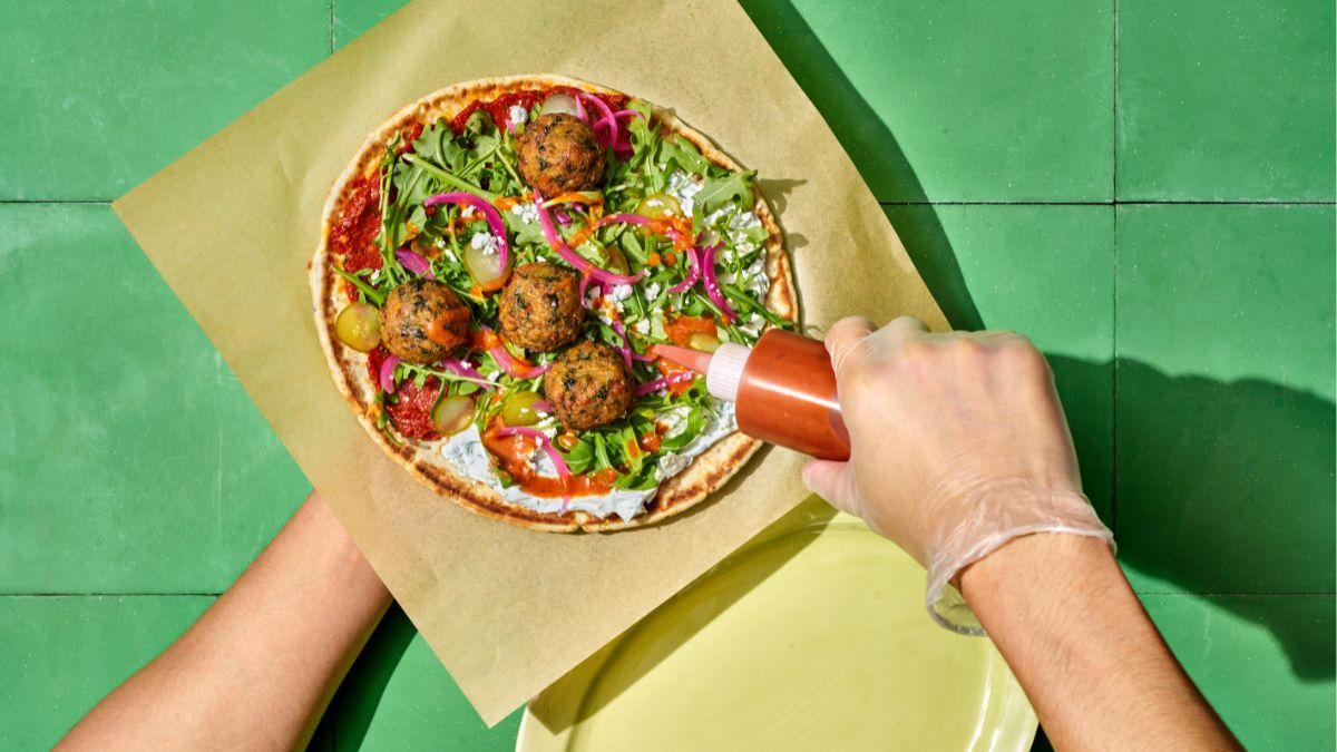 Image of loaded pita bread served at CAVA